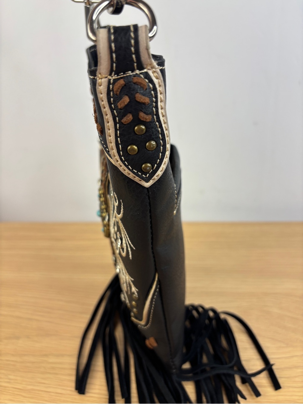Fringed Embroidered Black Vegan Leather Crossbody Bag with Turquoise Concho - Picture 5 of 12